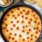 A cheesy pepperoni pizza dip made with a cream cheese base and topped off with pizza sauce Easy Baked Pizza Dip