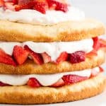 Strawberry Shortcake on a white cake stand.