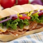 Hoagie Sandwich on a table cloth.