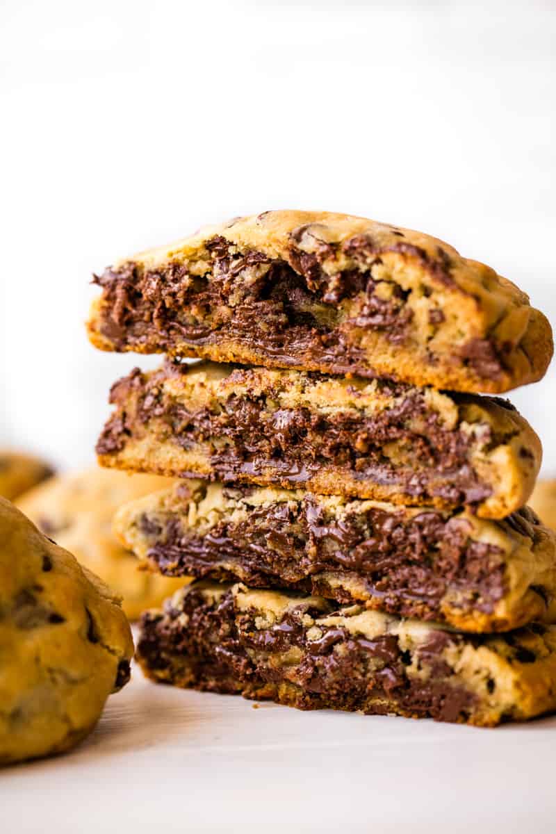 Bakery Style Chocolate Chip Cookies cut in half and stacked on each other.