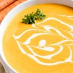 Carrot Soup in a white bowl.