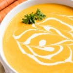 This Carrot Soup is so full of flavor it may very well become your new favorite soup Deliciously Creamy Carrot Soup