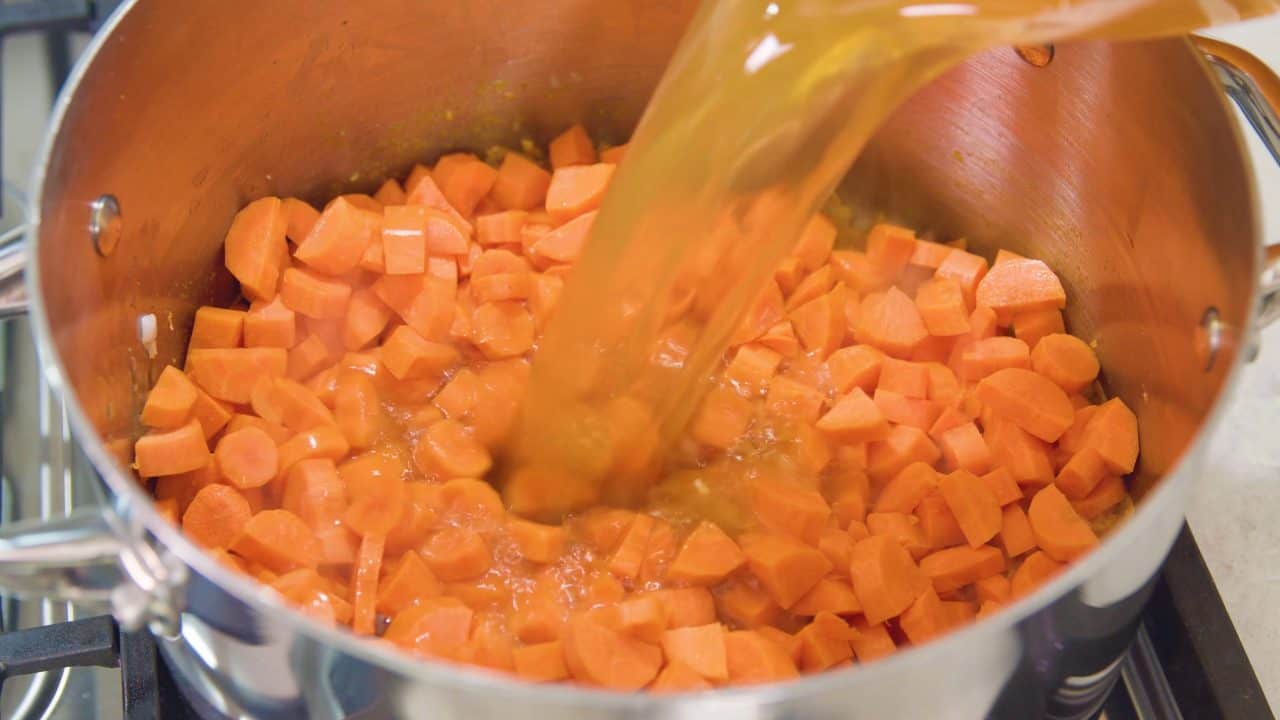 This Carrot Soup is so full of flavor it may very well become your new favorite soup Deliciously Creamy Carrot Soup