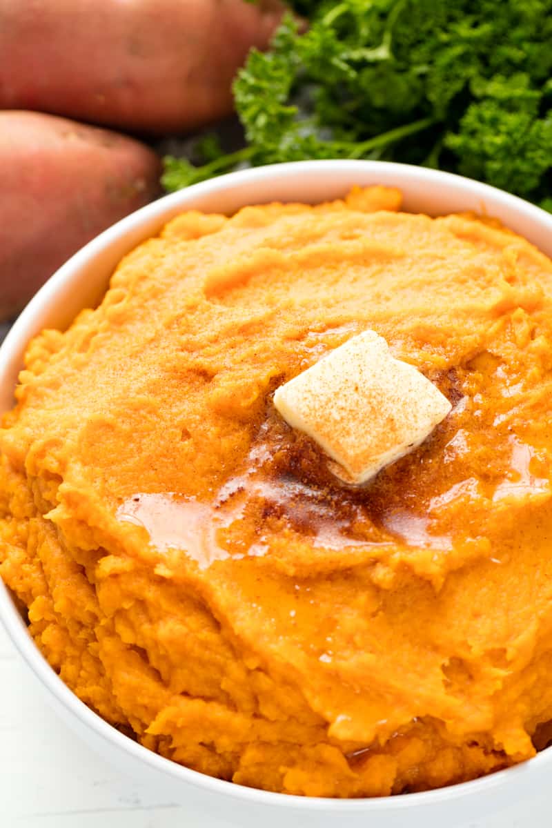 Deliciously easy Cinnamon Honey Butter Mashed Sweet Potatoes are a delightful side dish to Cinnamon Honey Butter Mashed Sweet Potatoes