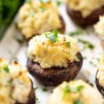 Crab Stuffed Mushrooms on a white plate.