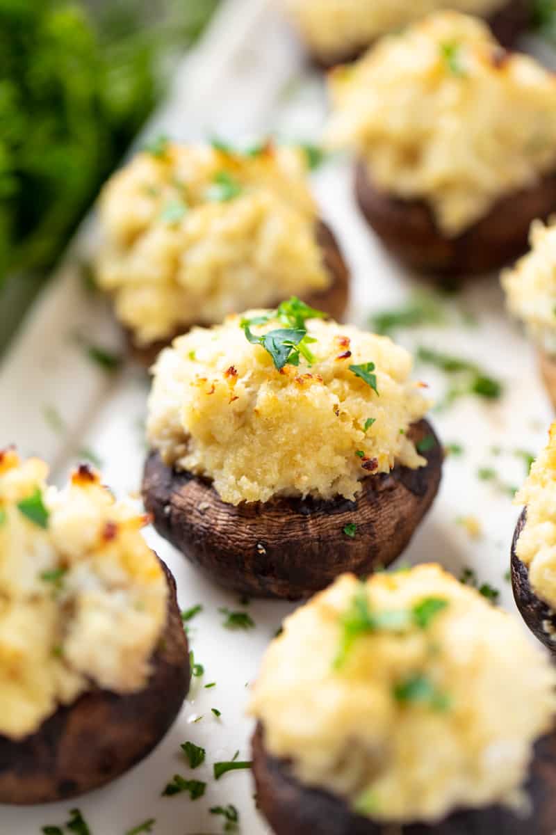 Crab Stuffed Mushrooms on a white plate.