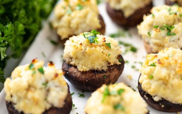 Crab Stuffed Mushrooms on a white plate.