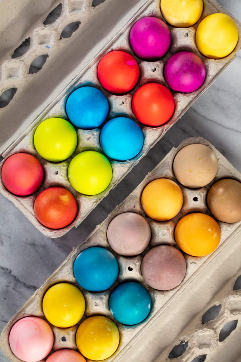Bird's eye view of Dyed Easter Eggs in egg cartons. 