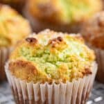 Close up of Pistachio Muffins on a wire rack.