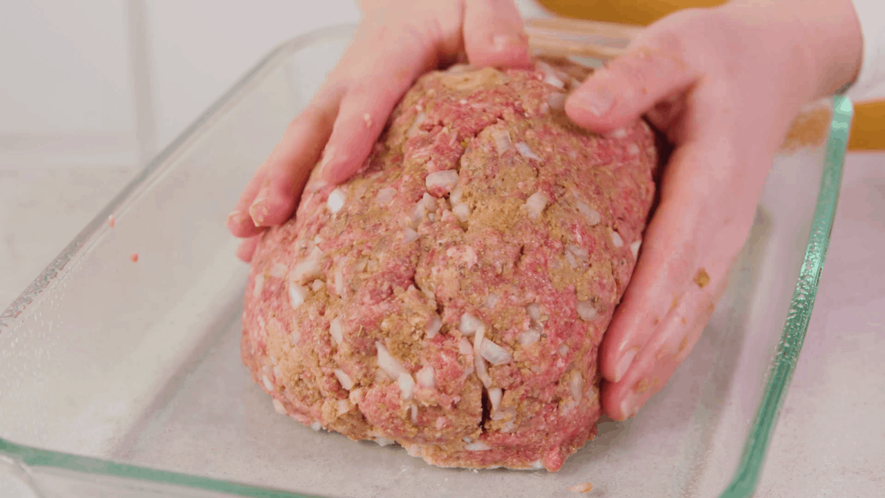 Shaping meatloaf in a 9x13 glass dish