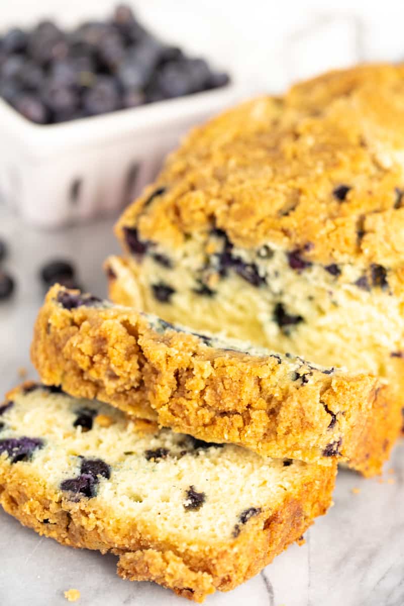 Blueberry Pancake Bread Loaf with two slices of it at the end.