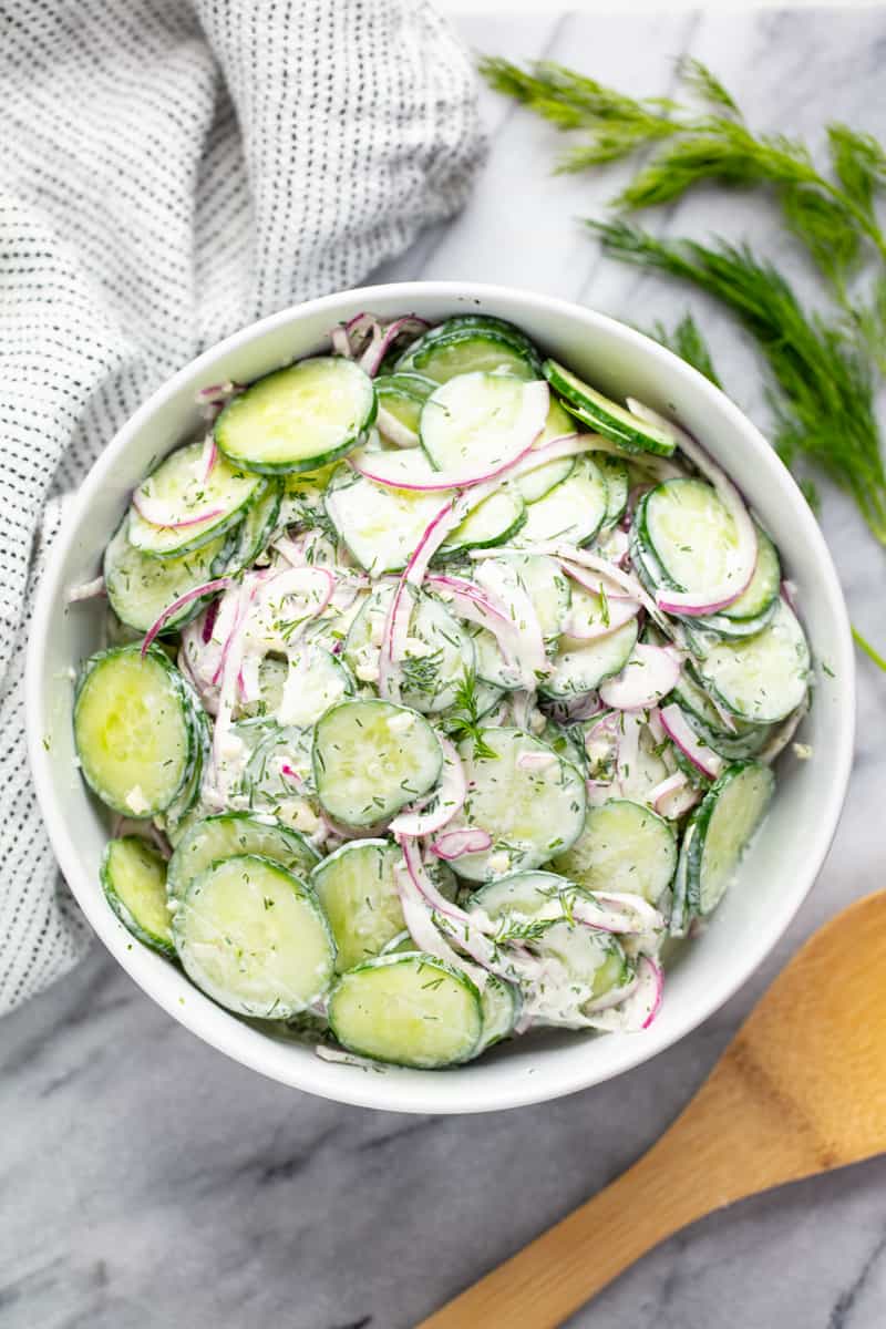 This Creamy Cucumber Salad recipe is a classic family favorite recipe Easy Creamy Cucumber Salad