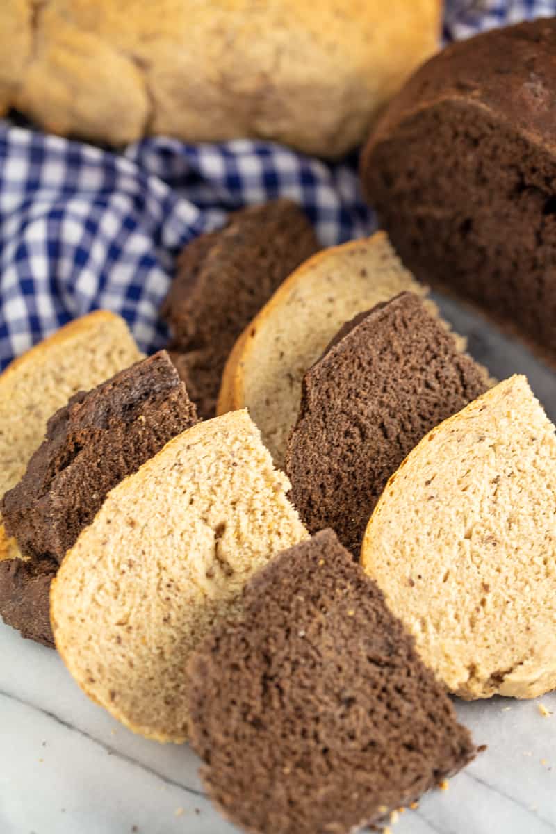 slices of dark and light homemade rye bread.