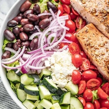 Bird's eye view of Balsamic Salmon Salad in a white bowl.