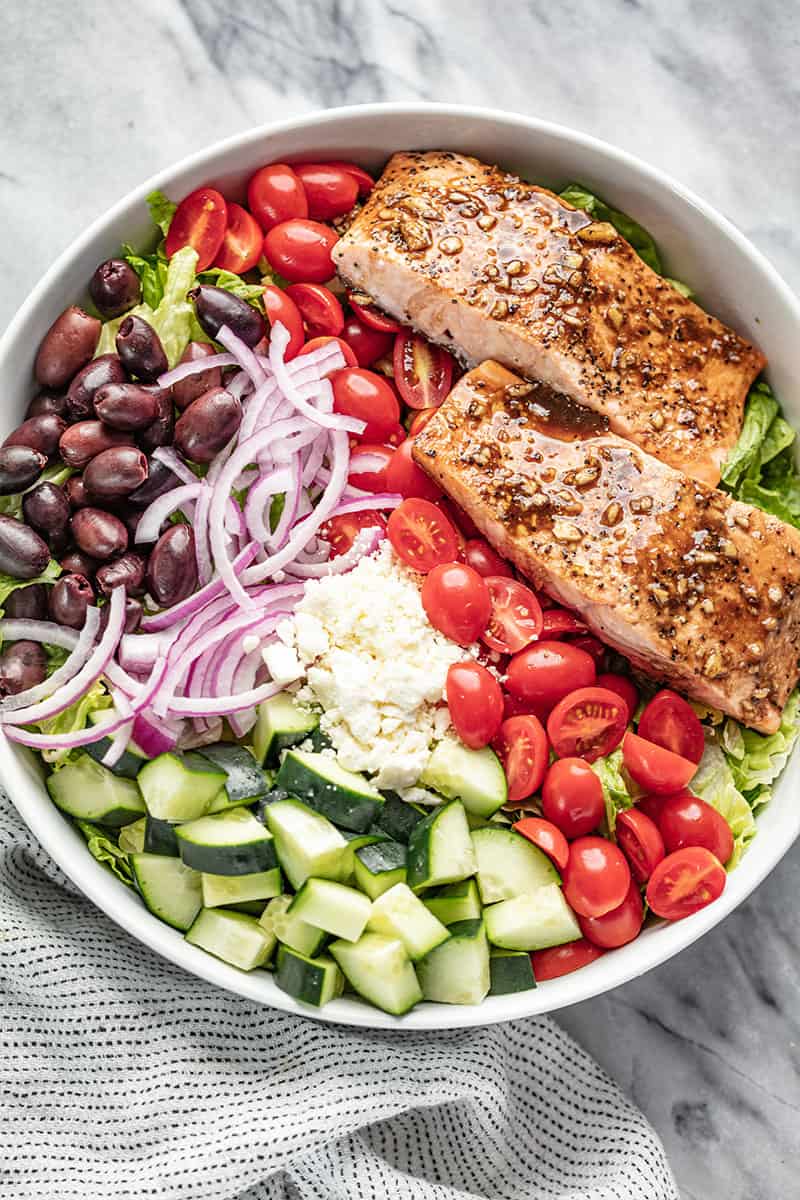 Bird's eye view of Balsamic Salmon Salad in a white bowl.