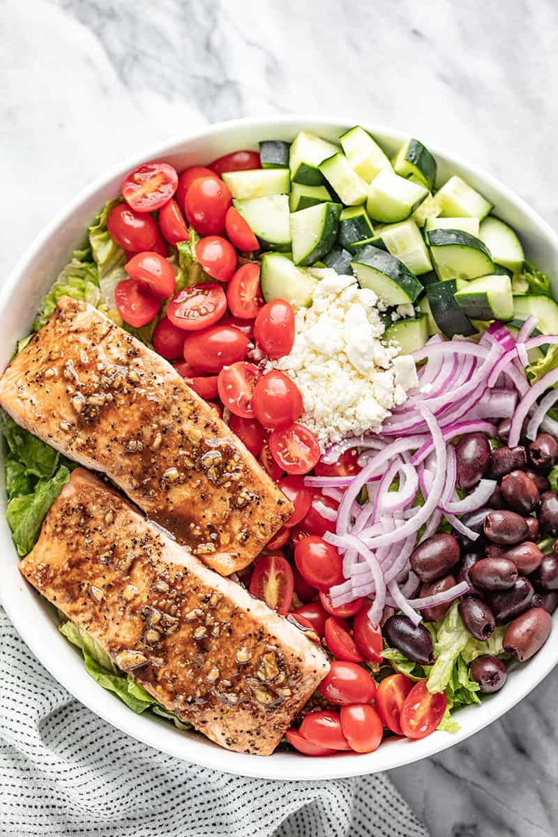 Bird's eye view of Balsamic Salmon Salad in a white bowl.