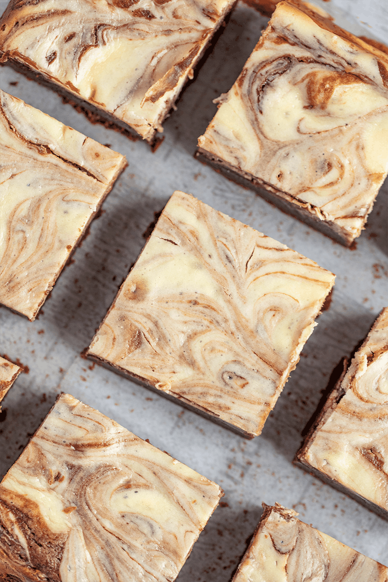 Bird's eye view of Cheesecake Brownies cut into squares.