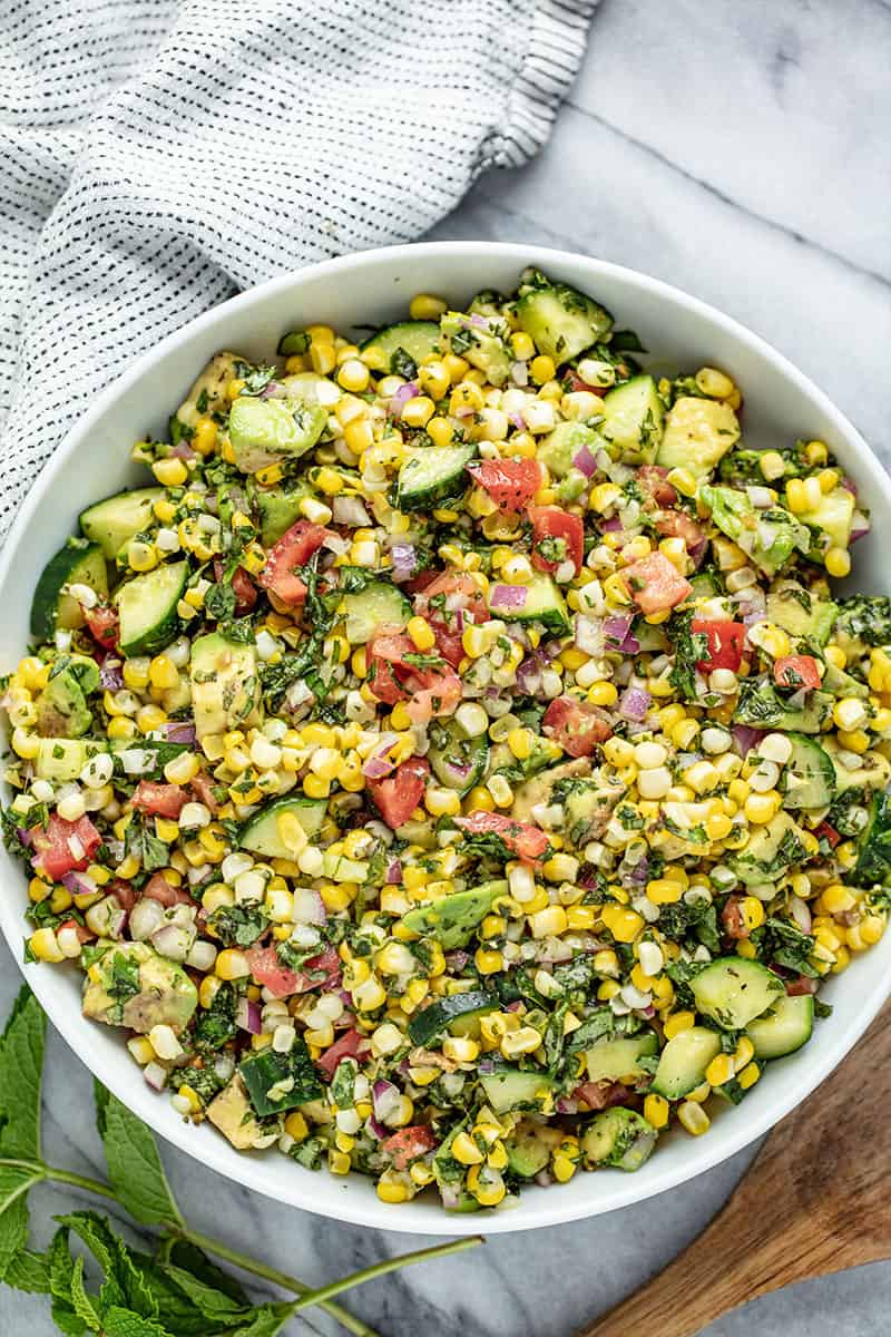 Bird's eye view of Corn Salad in a white bowl.