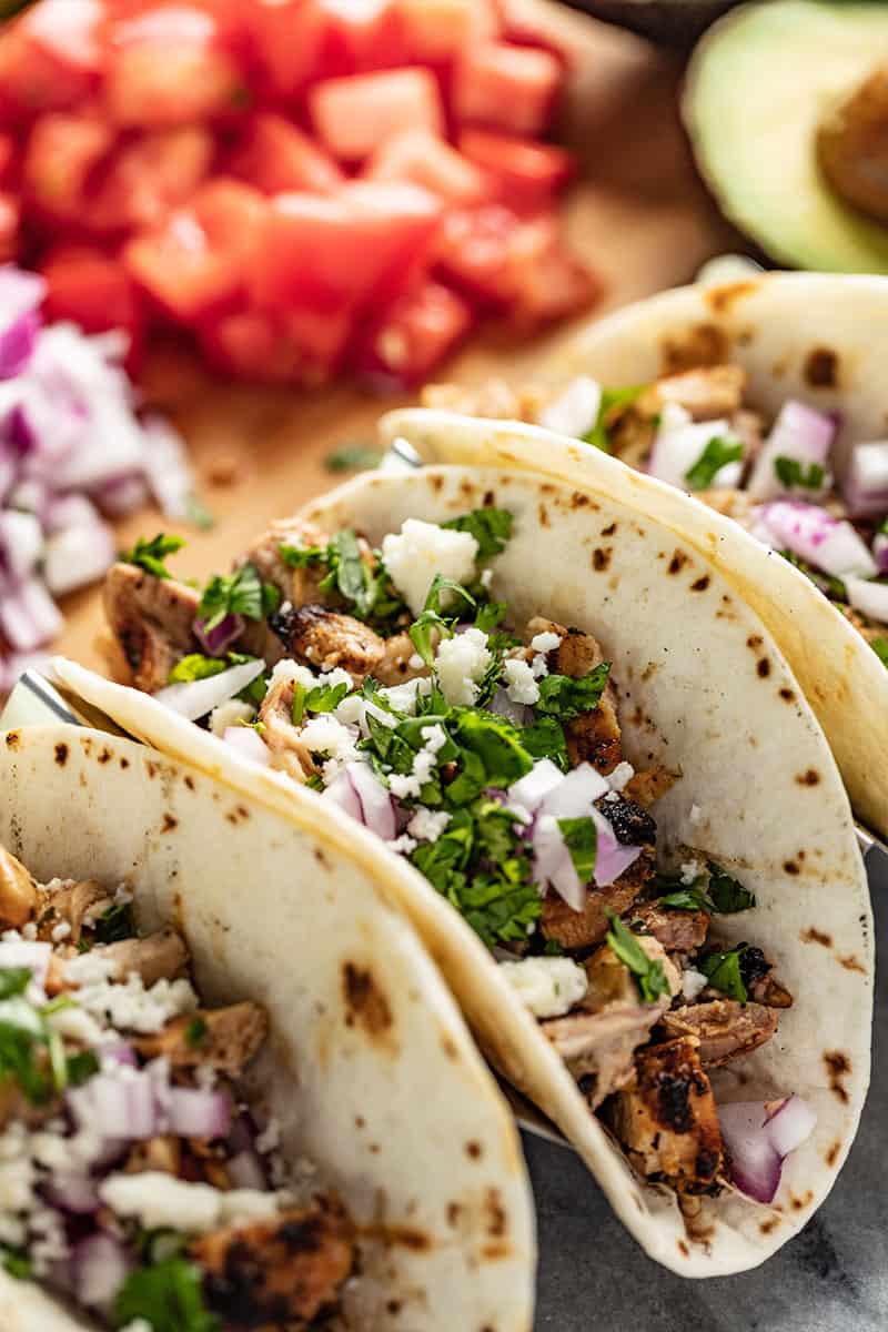 Close up of Chicken Tacos in a taco holder.