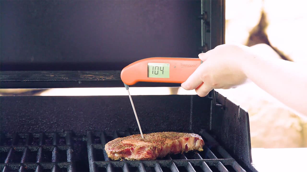 Using a food/temperature safe thermometer, check the internal temperature of the thickest part of the steak to desired doneness.