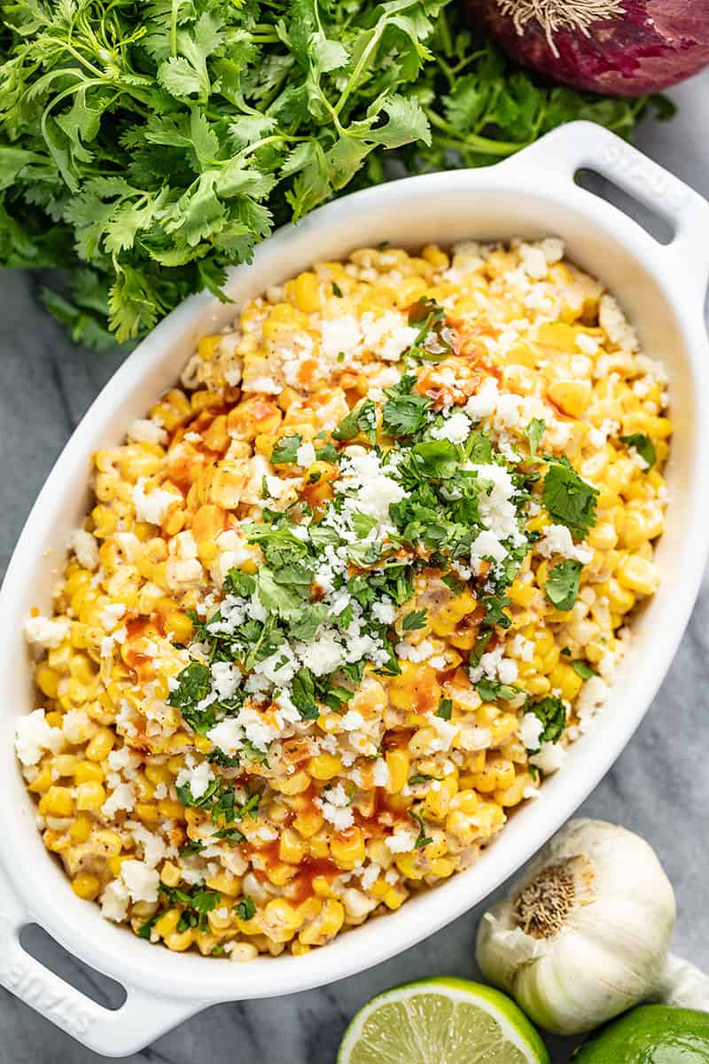 Bird's eye view of Mexican Street Corn Salad in a white dish.