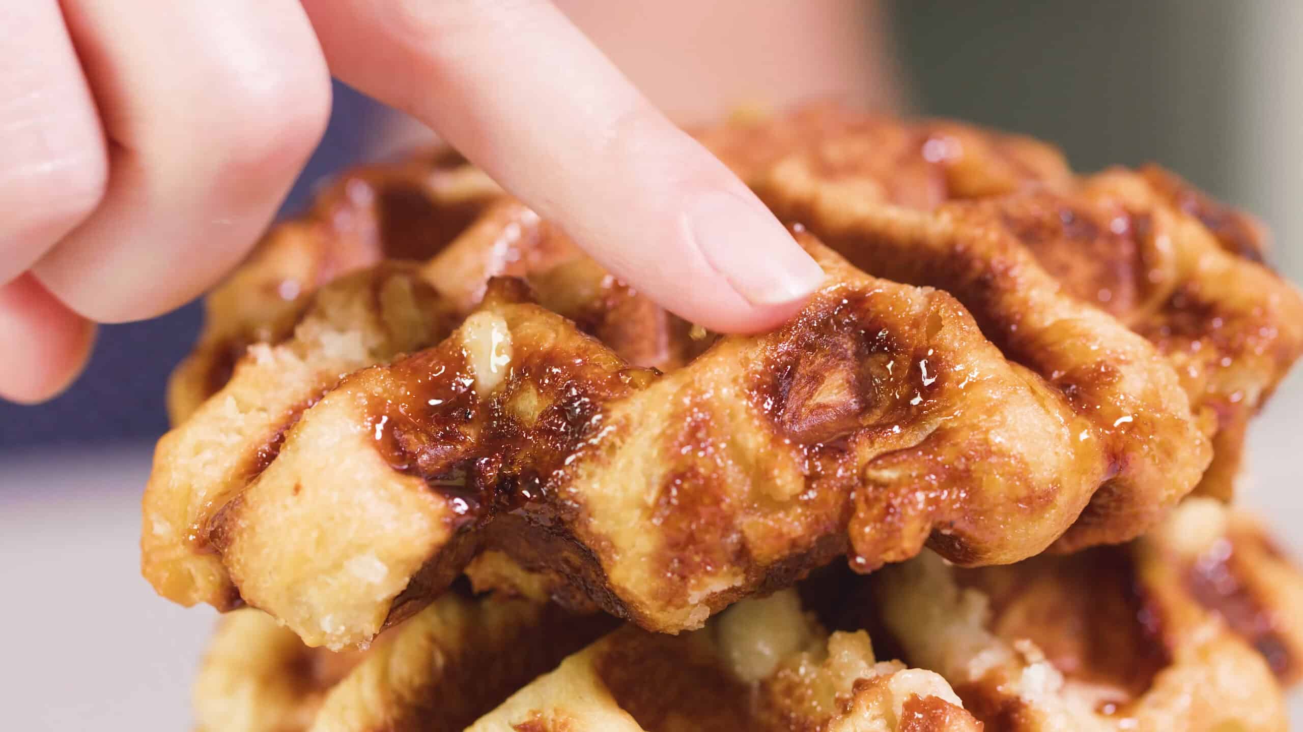 A close-up view of how the pearl sugar beads caramelize and integrate into the batter after cooking.