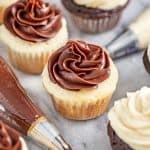 Chocolate Sweetened Condensed Milk Frosting on a white cupcake.