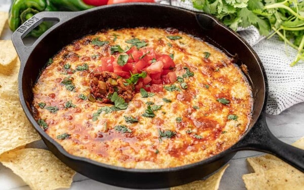 A skillet of queso fundido with chorizo