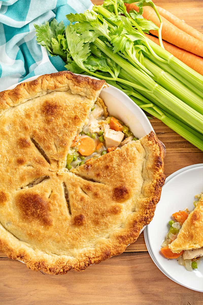 Bird's eye view of Chicken Pot Pie with a slice taken out of it.