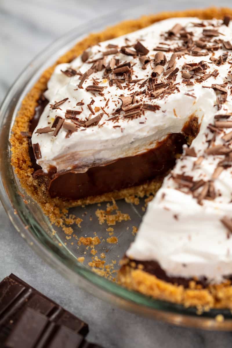 Chocolate cream pie with a slice cut out