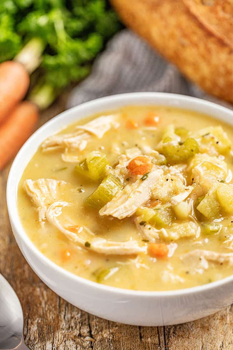 Close up of Turkey Soup in a white bowl.