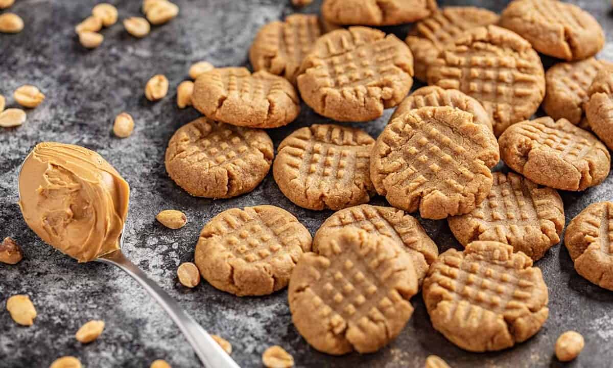 Peanut butter cookies with a spoonful of peanut butter