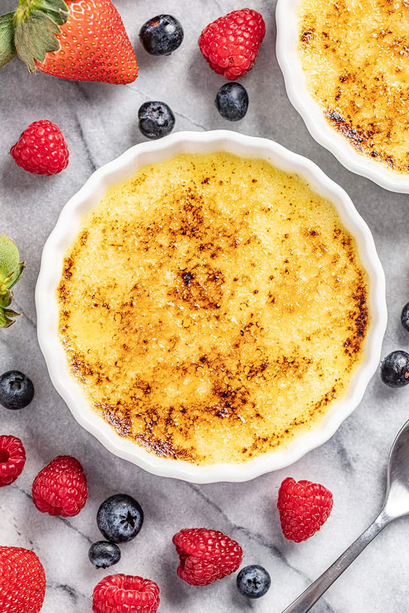 Creme Brulee in ramekin with berries