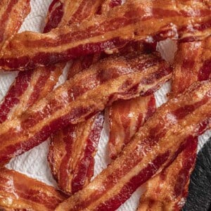 Oven cooked bacon on paper towel