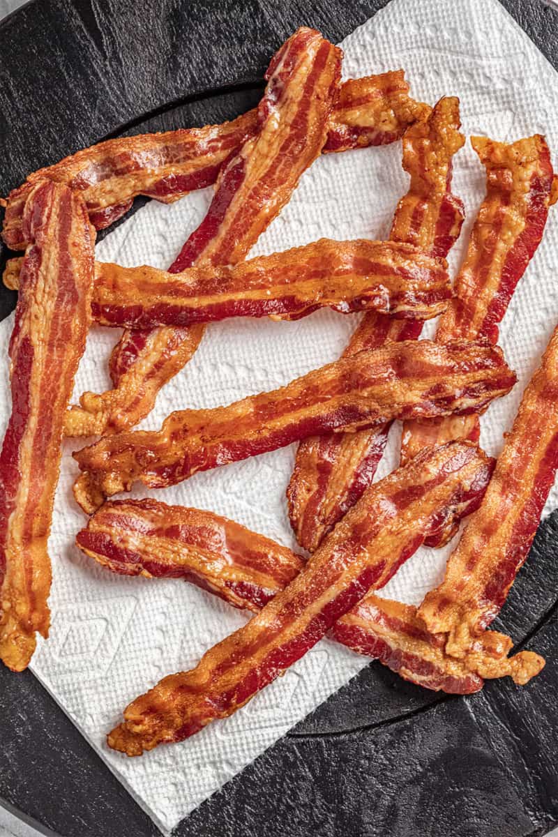 Oven cooked bacon on paper towel