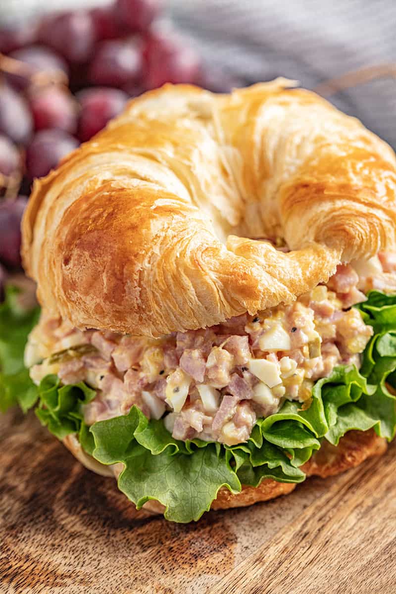 Ham salad on a flaky croissant with romaine lettuce