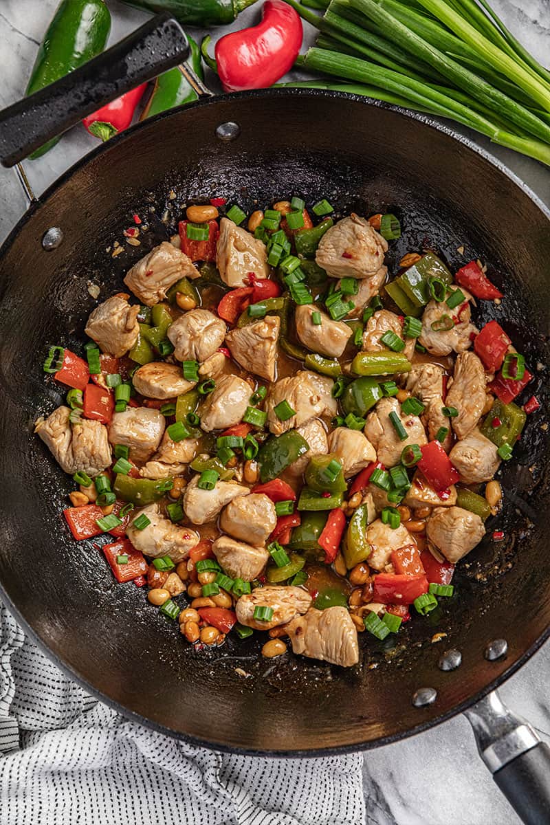 Kung pao chicken in a cast iron skillet