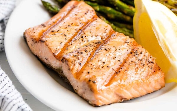Grilled salmon on a white plate