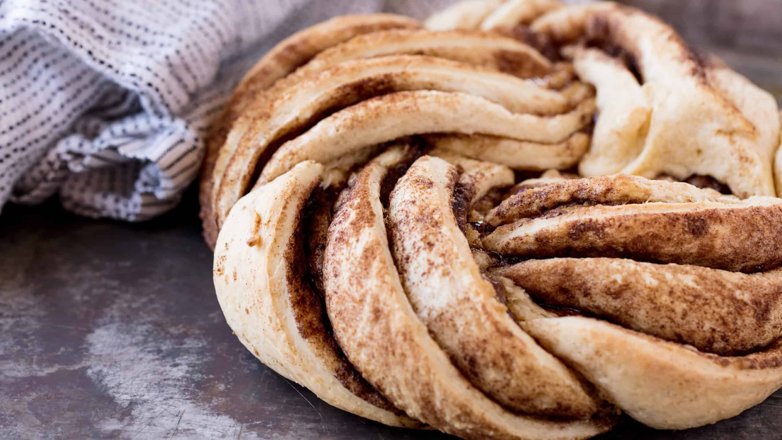 https://thestayathomechef.com/wp-content/uploads/2020/05/Cinnamon-Roll-Twist-Bread-2-scaled.jpg