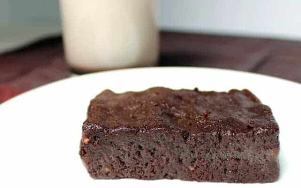 Raw brownie on a white plate