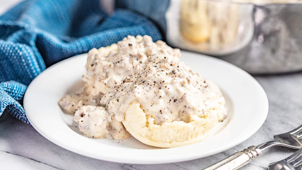 biscuits with sausage gravy on top