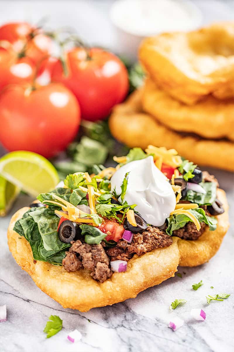a loaded navajo taco on indian fry bread