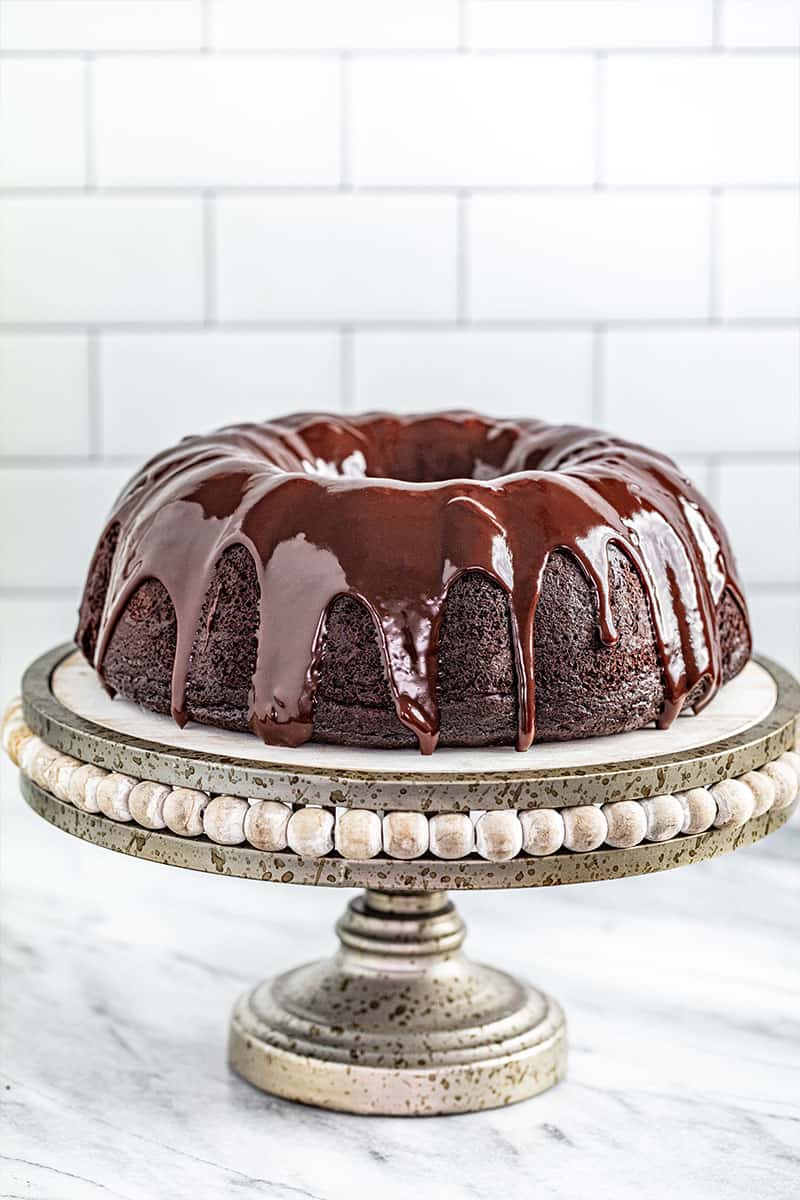 a whole chocolate bundt cake with chocolate ganache