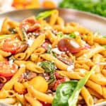 Penne pasta and vegetables in a skillet