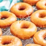Glazed donuts on a cooling rack