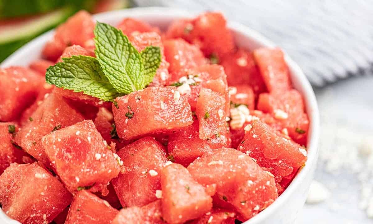 Watermelon feta salad with mint leaves on top