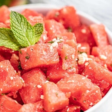 Watermelon feta salad with mint leaves on top