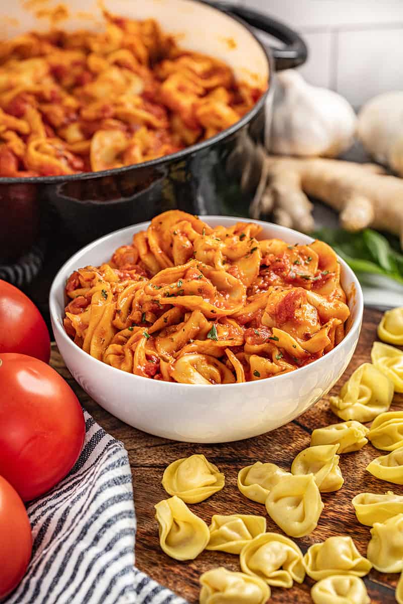 Tomato tortellini soup in a bowl.