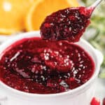 cranberry sauce with a spoon.