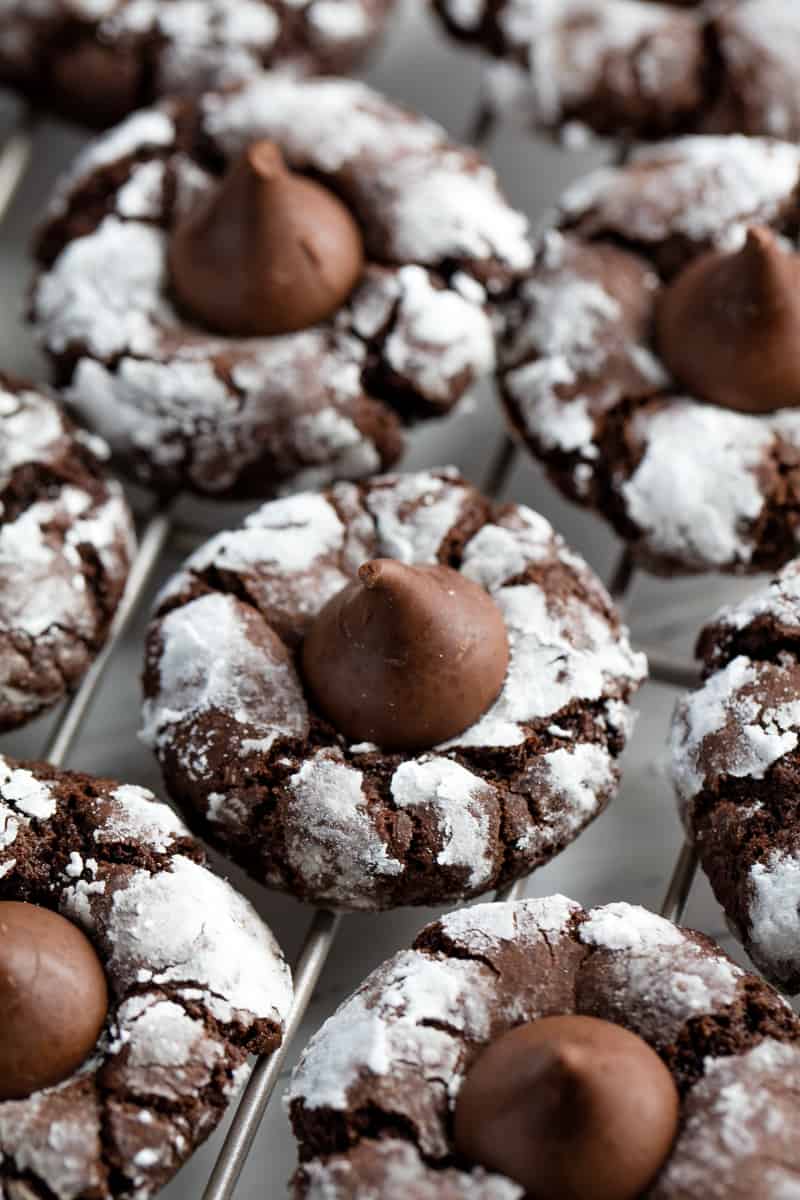 Chocolate kiss cookies on a wire cooling rack